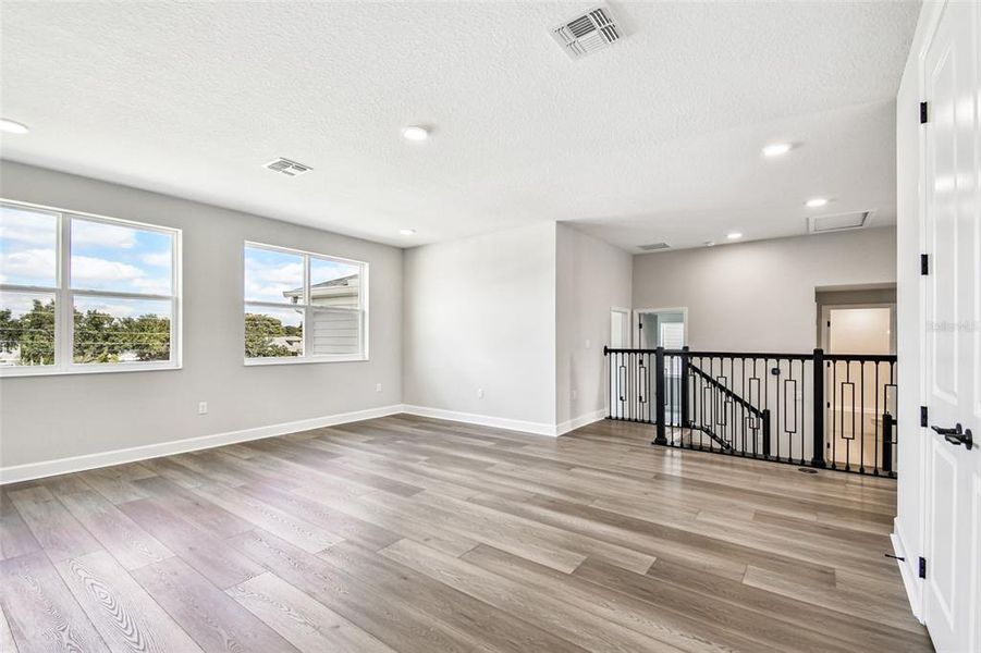 Spacious, unfurnished interior of a new home in Solace at Corner Lake, Orlando (Image 44).