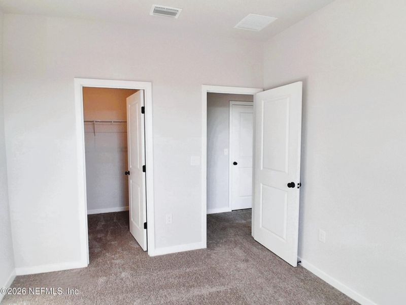 Spacious, unfurnished interior of a new home in Seminole Palms, Palm Coast (Image 21).