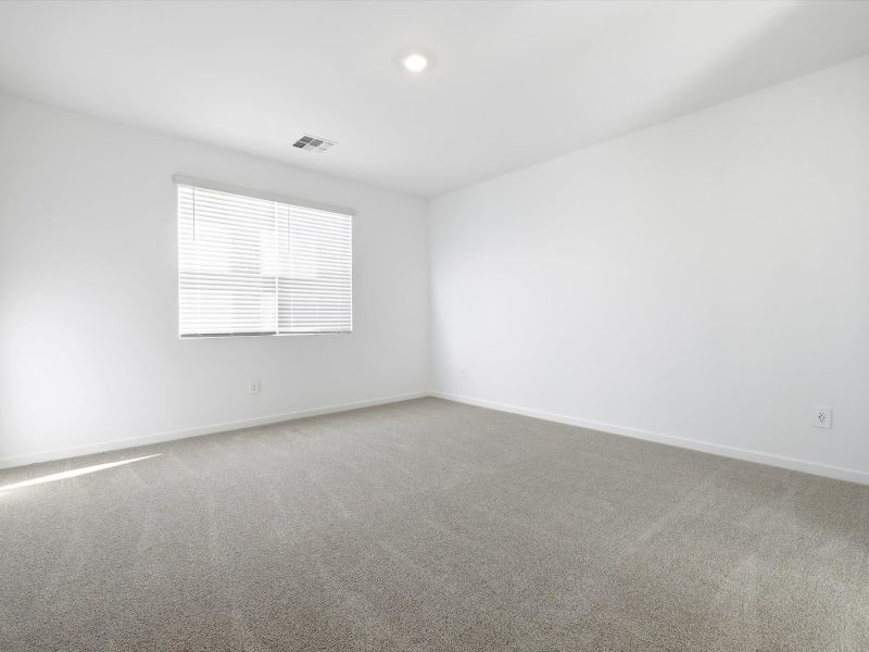 Spacious, unfurnished interior of a new home in Mountain View Estates Signature Series, Buckeye (Image 9).
