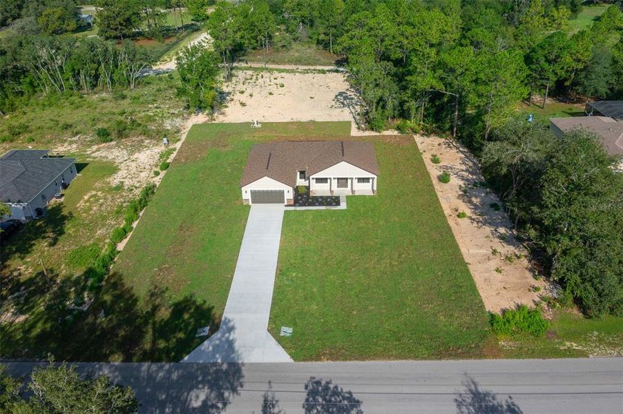 Front exterior of a new home in , Dunnellon, FL, highlighting curb appeal (Image 28).