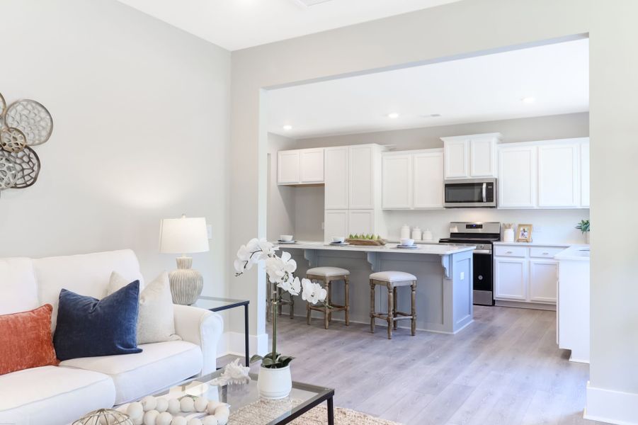 Representative furnished interior of a home built from the Inverness P by True Homes in Homecoming, Ravenel (Image 7).