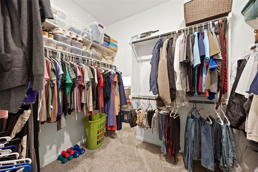 The adjoining walk-in closet offers excellent storage and organization. The adjoining walk-in closet offers excellent storage and organization.