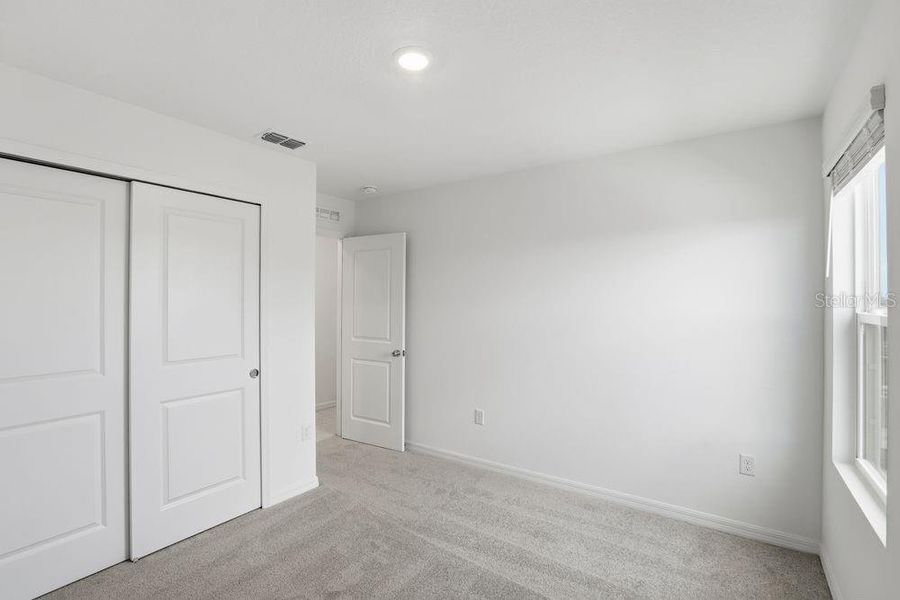 Spacious, unfurnished interior of a new home in Waterstone, Groveland (Image 34).