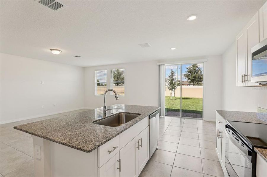 Furnished interior view inside a new home in Lawson Dunes - Signature Series, Haines City (Image 11).
