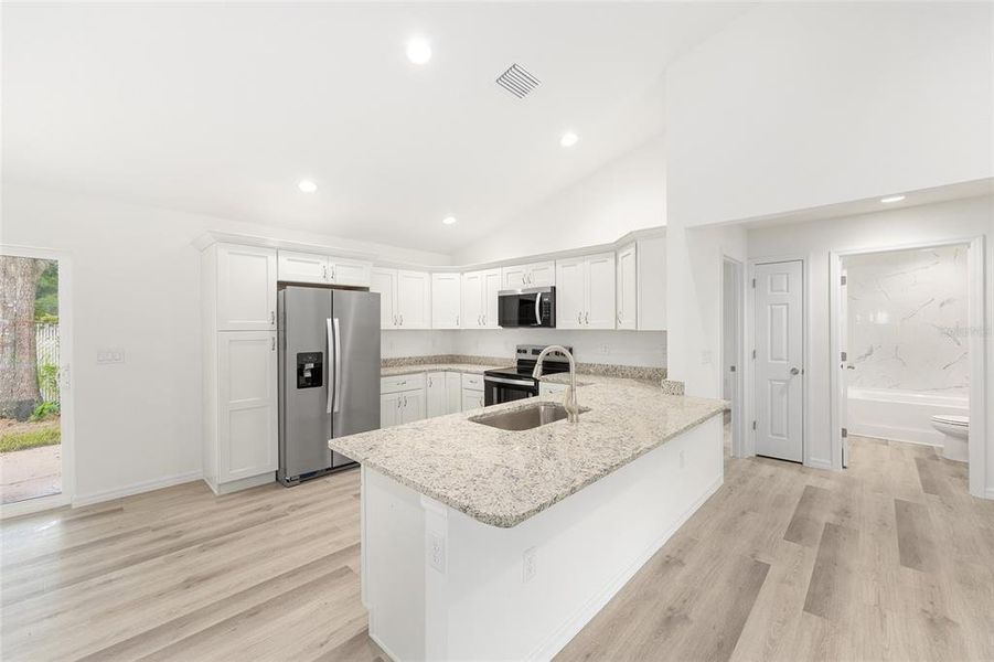 Furnished interior view inside a new home in , Ocala (Image 32).