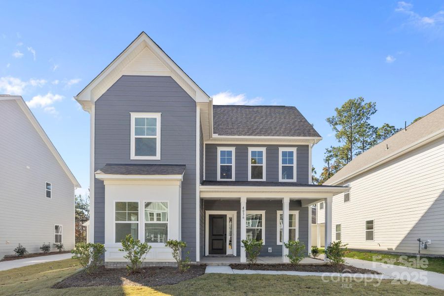 Front exterior of a new home in Arbor Village, Matthews, NC, highlighting curb appeal (Image 17).