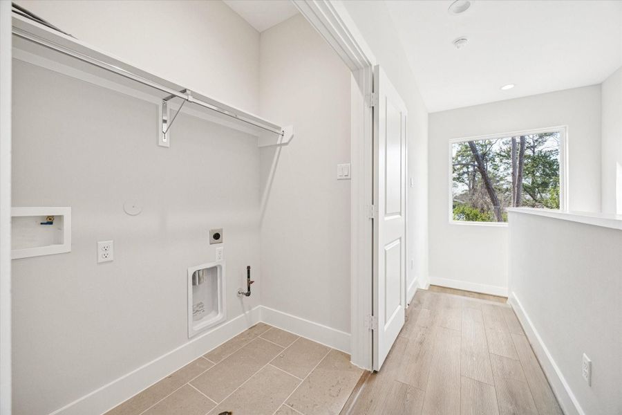 Laundry room conveniently located on the 3rd floor.