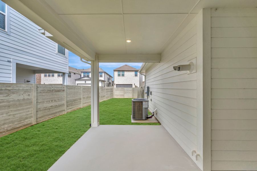 Exterior details and patio area of a home in The Retreat at Harvest, Argyle (Image 4). Exterior details and patio area of a home in The Retreat at Harvest, Argyle (Image 4).