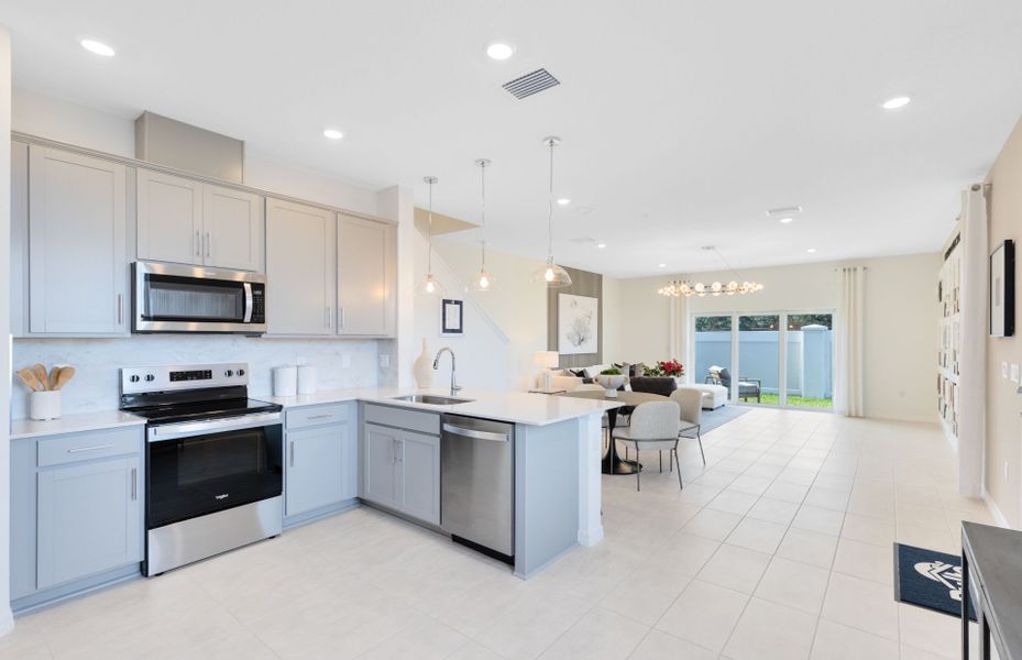 Representative furnished interior of a home built from the Marigold by Pulte Homes in Harbor Square, Palm Bay (Image 7).
