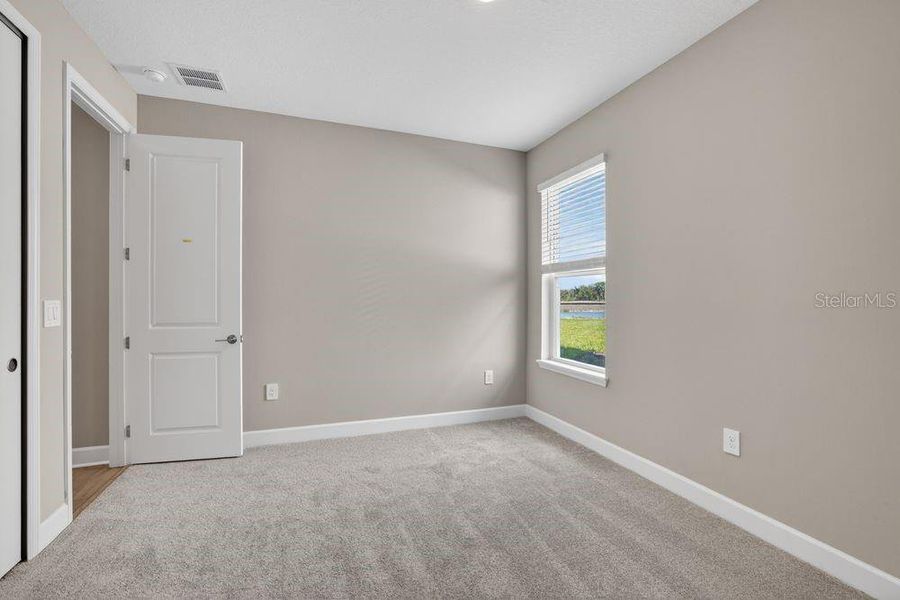 Spacious, unfurnished interior of a new home in Firethorn, Parrish (Image 42).