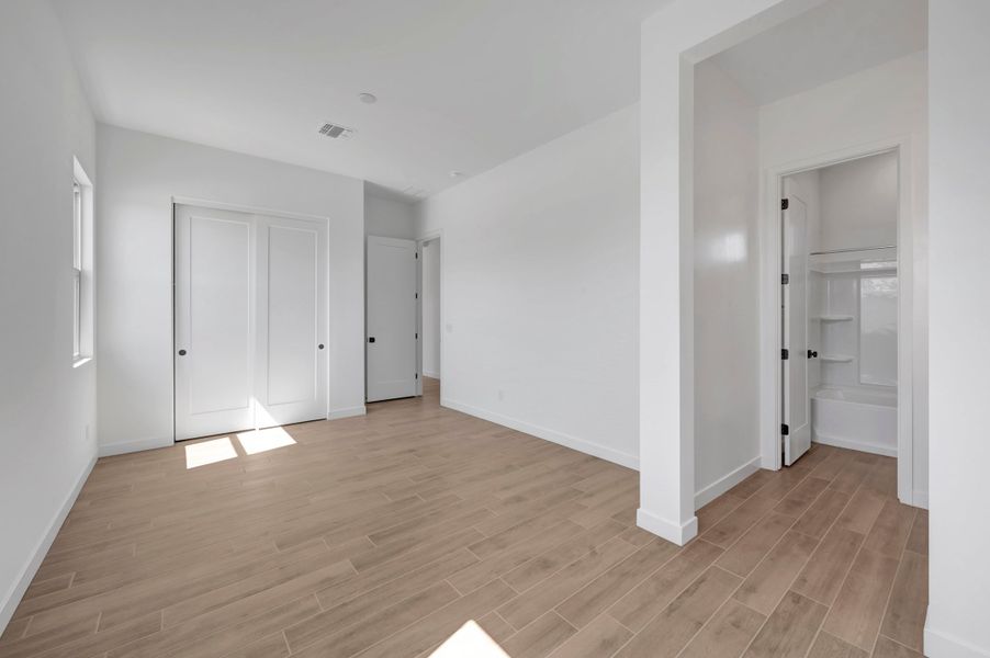 Spacious, unfurnished interior of a new home in Abel Ranch, Goodyear (Image 37).