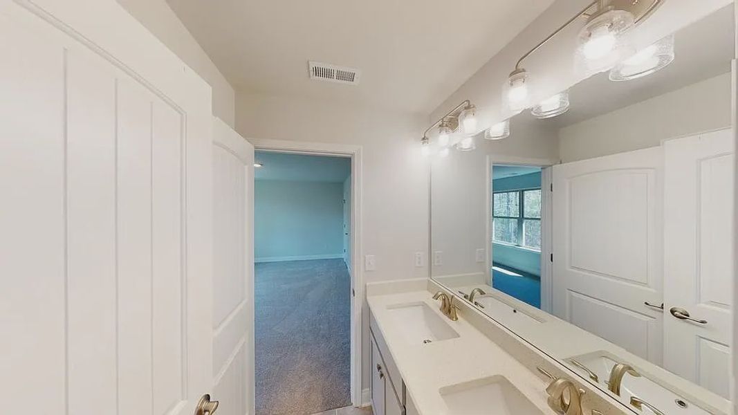 Furnished interior view inside a new home in Mirror Lake at South Harbour, Villa Rica (Image 7).