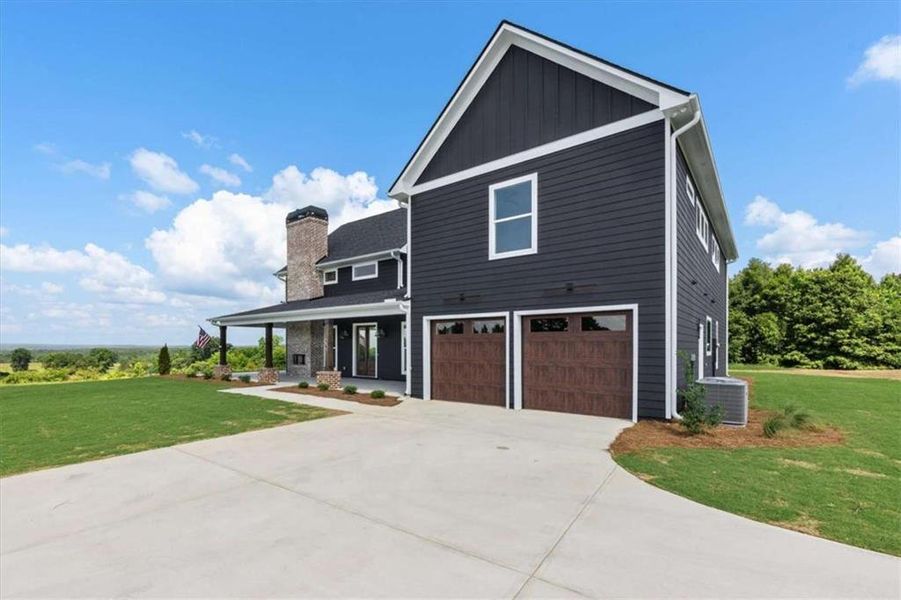 Front exterior of a new home in , Roopville, GA, highlighting curb appeal (Image 31).