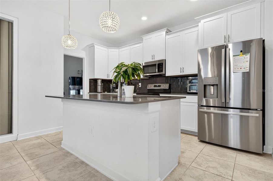 Furnished interior view inside a new home in Storey Park: Innovation Cottage Collection, Orlando (Image 17).