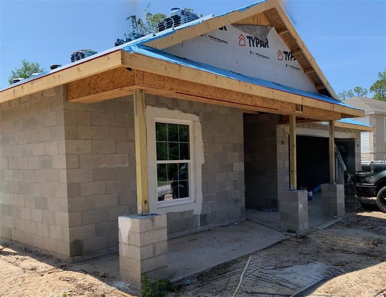 Front exterior of a new home in Citrus Springs Sub, Dunnellon, FL, highlighting curb appeal (Image 6).