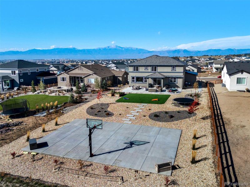 Spectacular Outdoor Oasis With Basketball/Pickleball Court, Raised Garden Beds And More