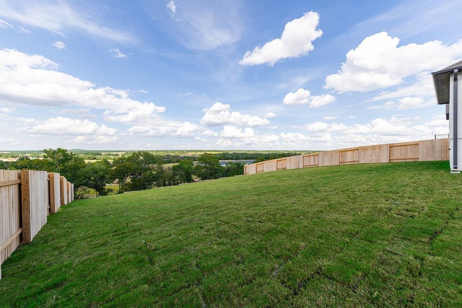 Exterior details and patio area of a home in Lariat - 80', Liberty Hill (Image 21).
