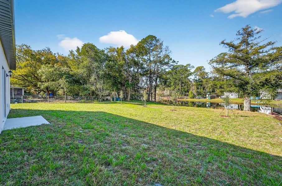 Exterior details and patio area of a home in , Deltona (Image 3).