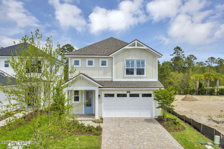 Front exterior of a new home in Seabrook Village at Seabrook, Ponte Vedra, FL, highlighting curb appeal (Image 29). Front exterior of a new home in Seabrook Village at Seabrook, Ponte Vedra, FL, highlighting curb appeal (Image 29).