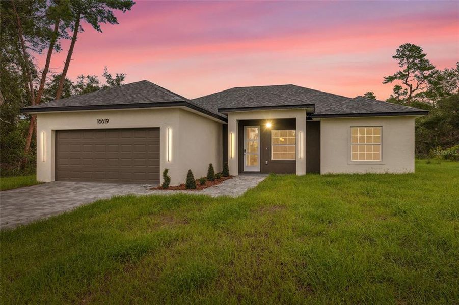 Front exterior of a new home in , Ocala, FL, highlighting curb appeal (Image 27).