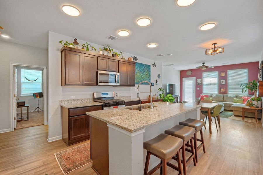 Furnished interior view inside a new home in Stallion Run, Buda (Image 24).