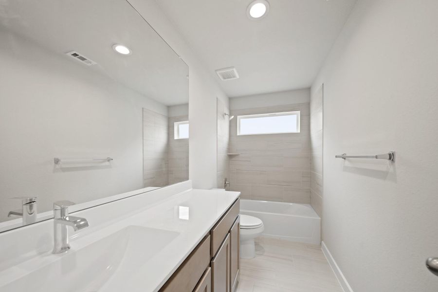 Furnished interior view inside a new home in Beacon Hill, Waller (Image 9).