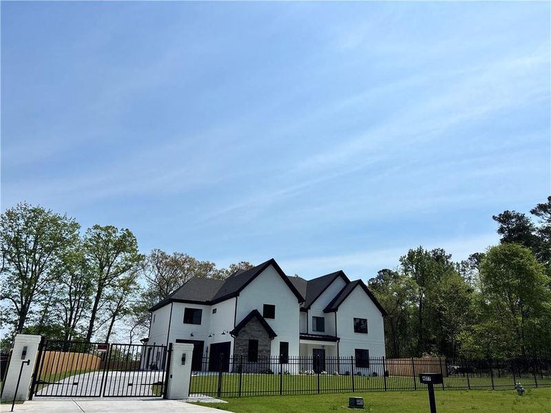Front exterior of a new home in , Buford, GA, highlighting curb appeal (Image 32).