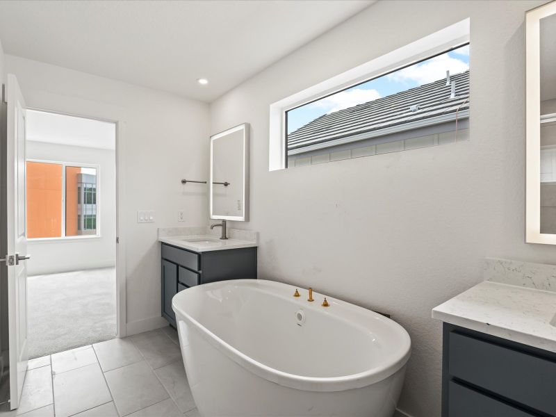 Furnished interior view inside a new home in Ascent at Inverness, Englewood (Image 10).