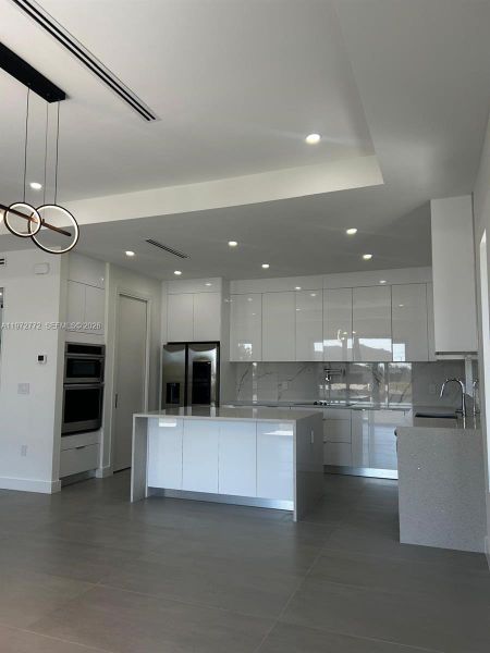 Furnished interior view inside a new home in , Cape Coral (Image 7). Furnished interior view inside a new home in , Cape Coral (Image 7).