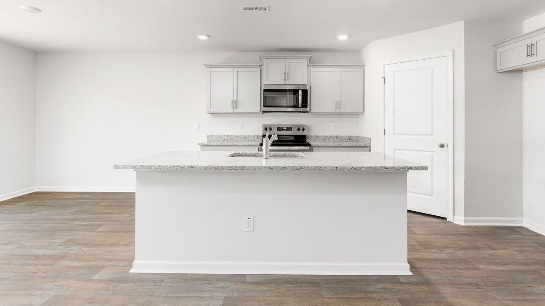 Representative furnished interior of a home built from the Hayden by D.R. Horton in Country Creek, Lexington (Image 5).