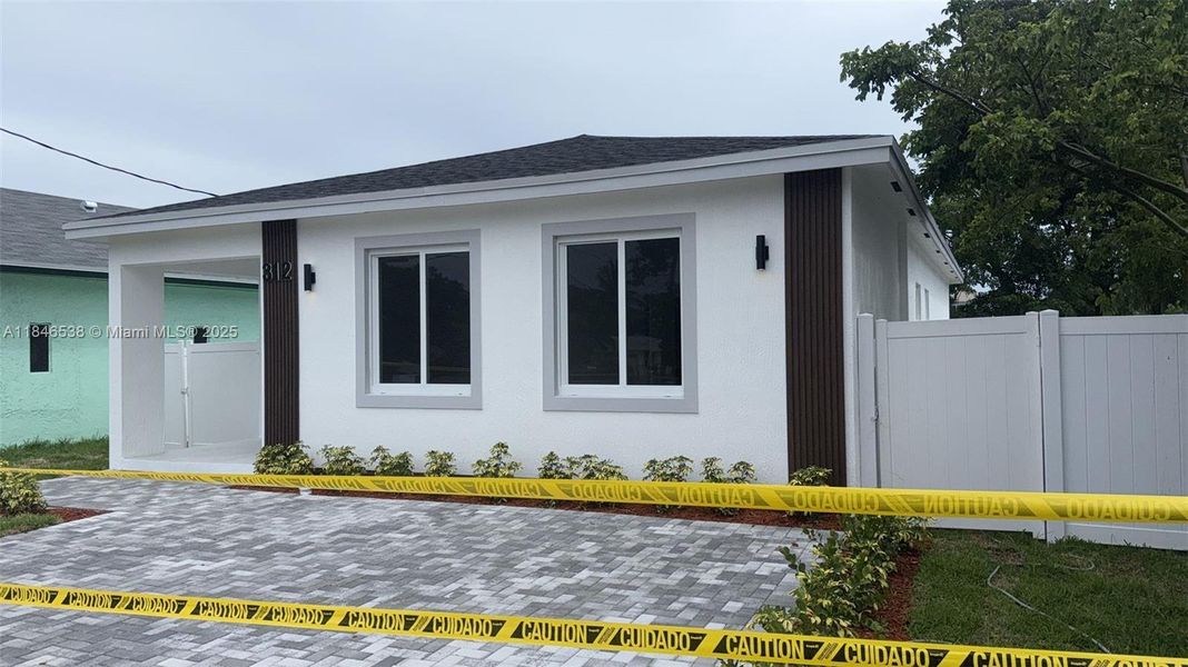 Front exterior of a new home in , Hallandale Beach, FL, highlighting curb appeal (Image 1). Front exterior of a new home in , Hallandale Beach, FL, highlighting curb appeal (Image 1).