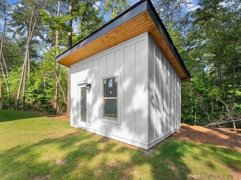 Exterior details and patio area of a home in , Dahlonega (Image 61).
