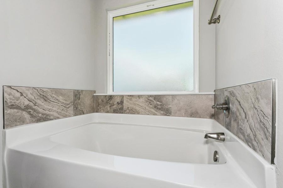 Representative interior finishes for a home built from the The Ruby by Herbst Homes in Buckeyes Landing, Navarre (Image 24).