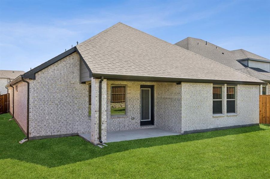 Patio in the Oscar home plan by Trophy Signature Homes – REPRESENTATIVE PHOTO Patio in the Oscar home plan by Trophy Signature Homes – REPRESENTATIVE PHOTO