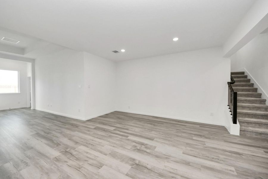 Spacious, unfurnished interior of a new home in 50' Traditional Homes at Elyson, Katy (Image 20).