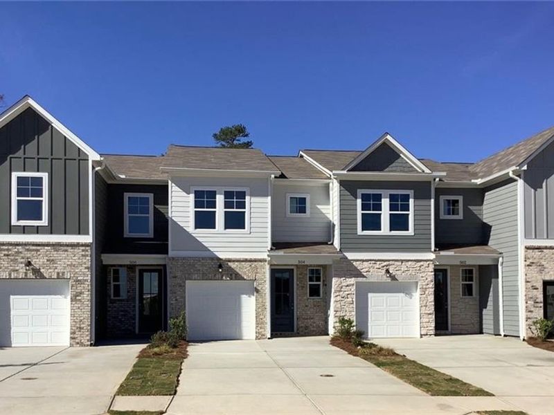 Front exterior of a new home in Stegall Village, Emerson, GA, highlighting curb appeal (Image 2).