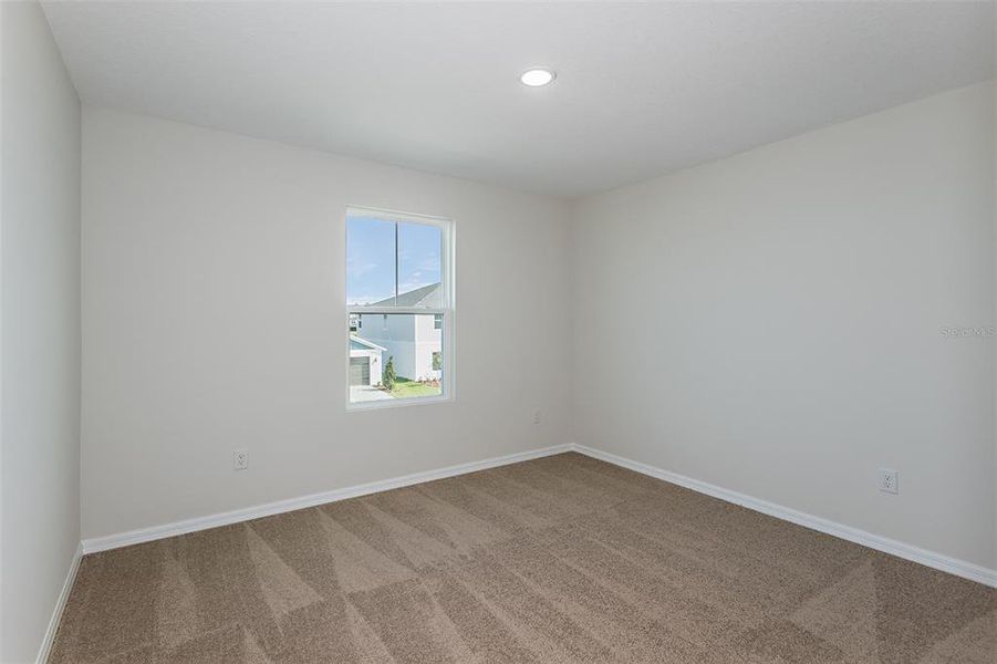 Spacious, unfurnished interior of a new home in Scenic Terrace, Haines City (Image 44).