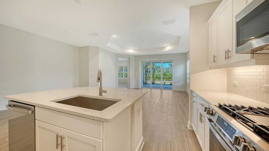 Furnished interior view inside a new home in Wildleaf, Parrish (Image 9).