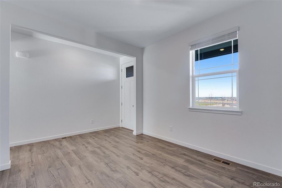 Spacious, unfurnished interior of a new home in Trails at Crowfoot, Parker (Image 30).