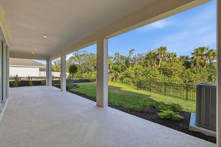 Exterior details and patio area of a home in Indigo Creek, Apollo Beach (Image 3).