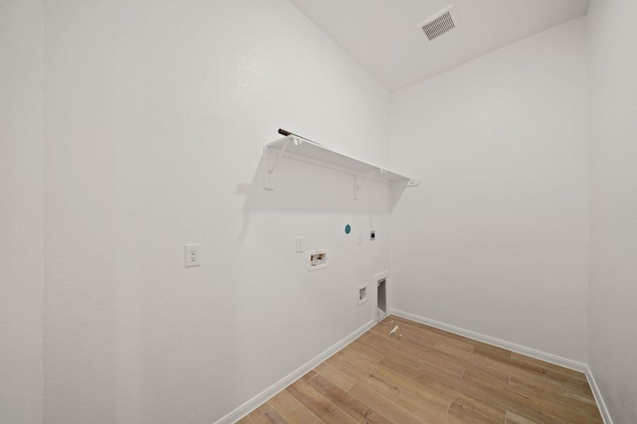 Laundry room (*Photo not of actual home and used for illustration purposes only.)