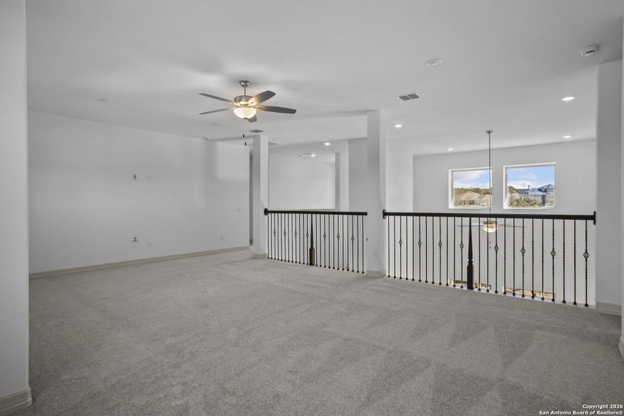 Spacious, unfurnished interior of a new home in Highland Estates, San Antonio (Image 24).