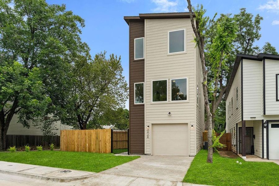 Front exterior of a new home in , Dallas, TX, highlighting curb appeal (Image 25).