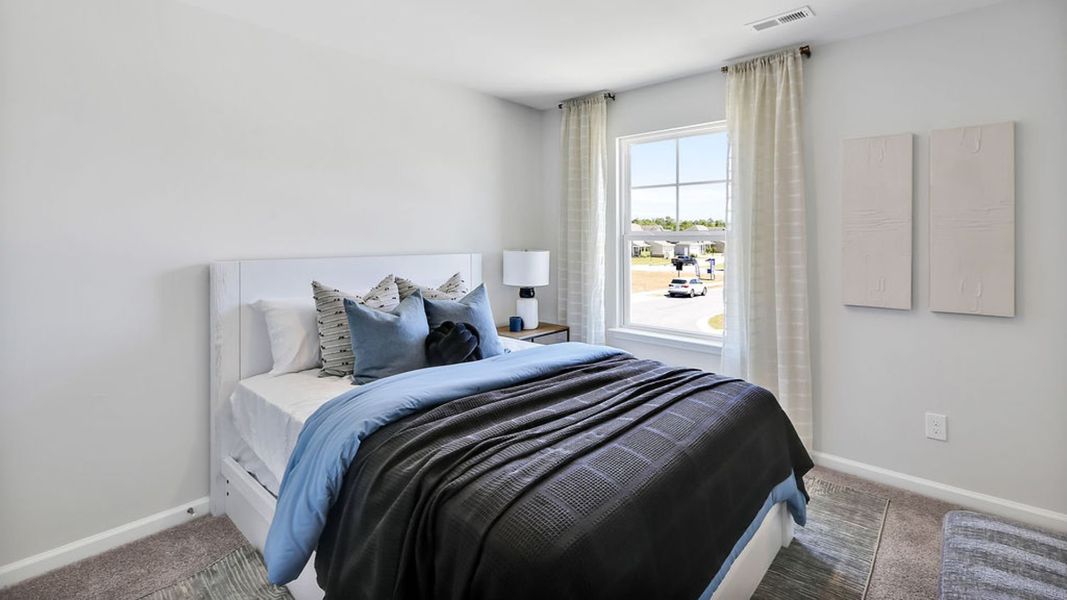 Representative furnished interior of a home built from the MITCHELL TOWNHOME by D.R. Horton in Grayson Park Townhomes, Leland (Image 26). Representative furnished interior of a home built from the MITCHELL TOWNHOME by D.R. Horton in Grayson Park Townhomes, Leland (Image 26).