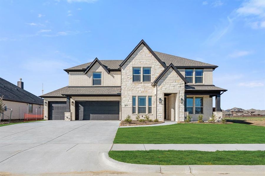 Front exterior of a new home in Somerset, Venus, TX, highlighting curb appeal (Image 2).
