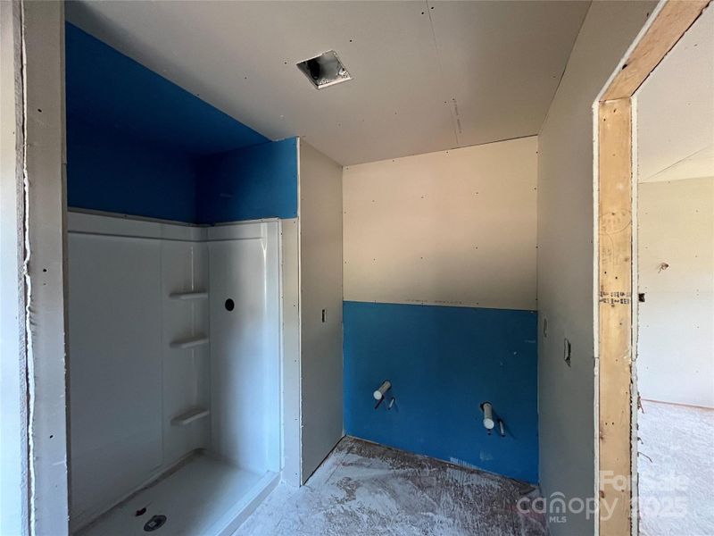 Primary En Suite with Double Vanities Walk in Shower and Linen Closet Primary En Suite with Double Vanities Walk in Shower and Linen Closet