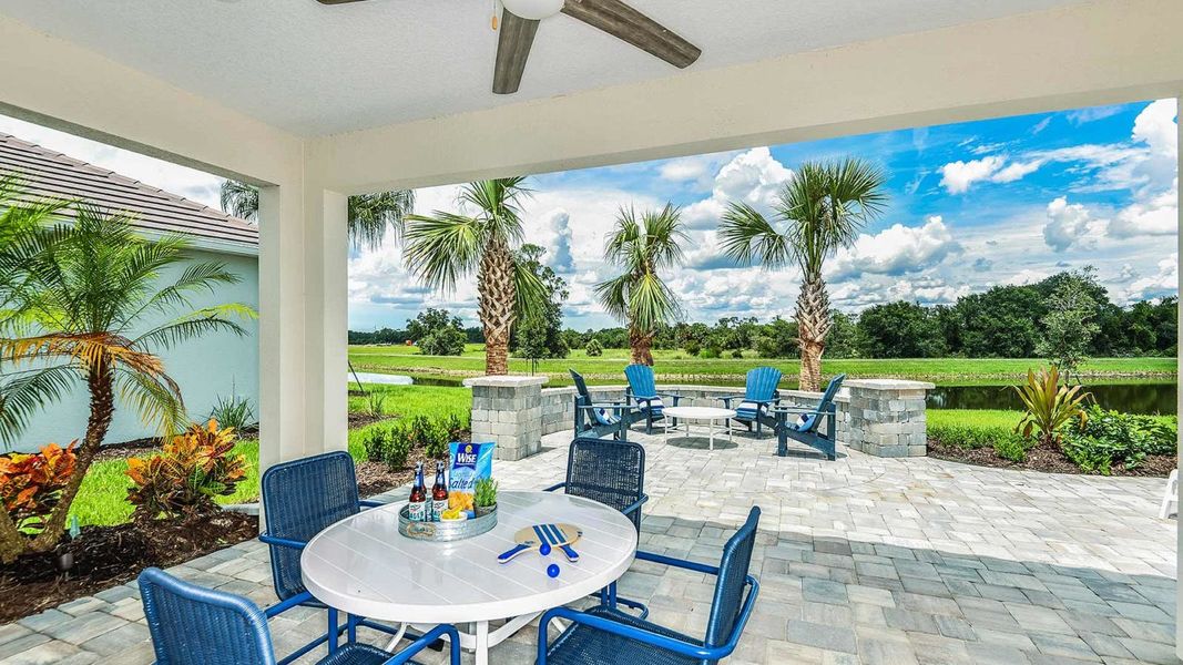 Exterior details and patio area of a home in SkySail Real Estate and Homes for Sale in Naples, FL - Neal Communities, Naples (Image 4).