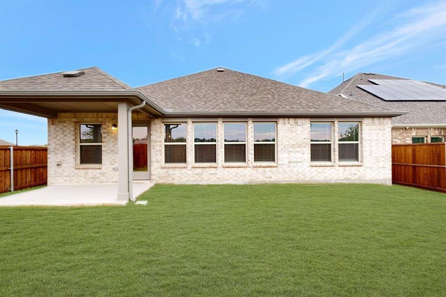 Exterior details and patio area of a home in The Preserve, Justin (Image 3). Exterior details and patio area of a home in The Preserve, Justin (Image 3).