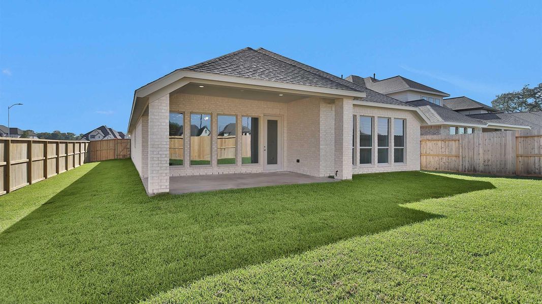 Exterior details and patio area of a home in Sienna 50', Missouri City (Image 2). Exterior details and patio area of a home in Sienna 50', Missouri City (Image 2).