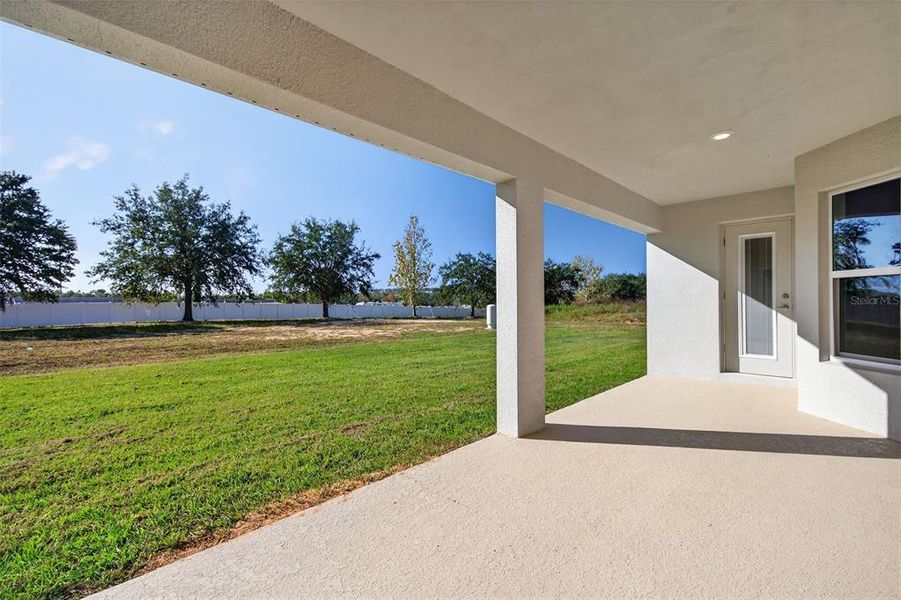 Exterior details and patio area of a home in Hill Country Estates, Dade City (Image 32).